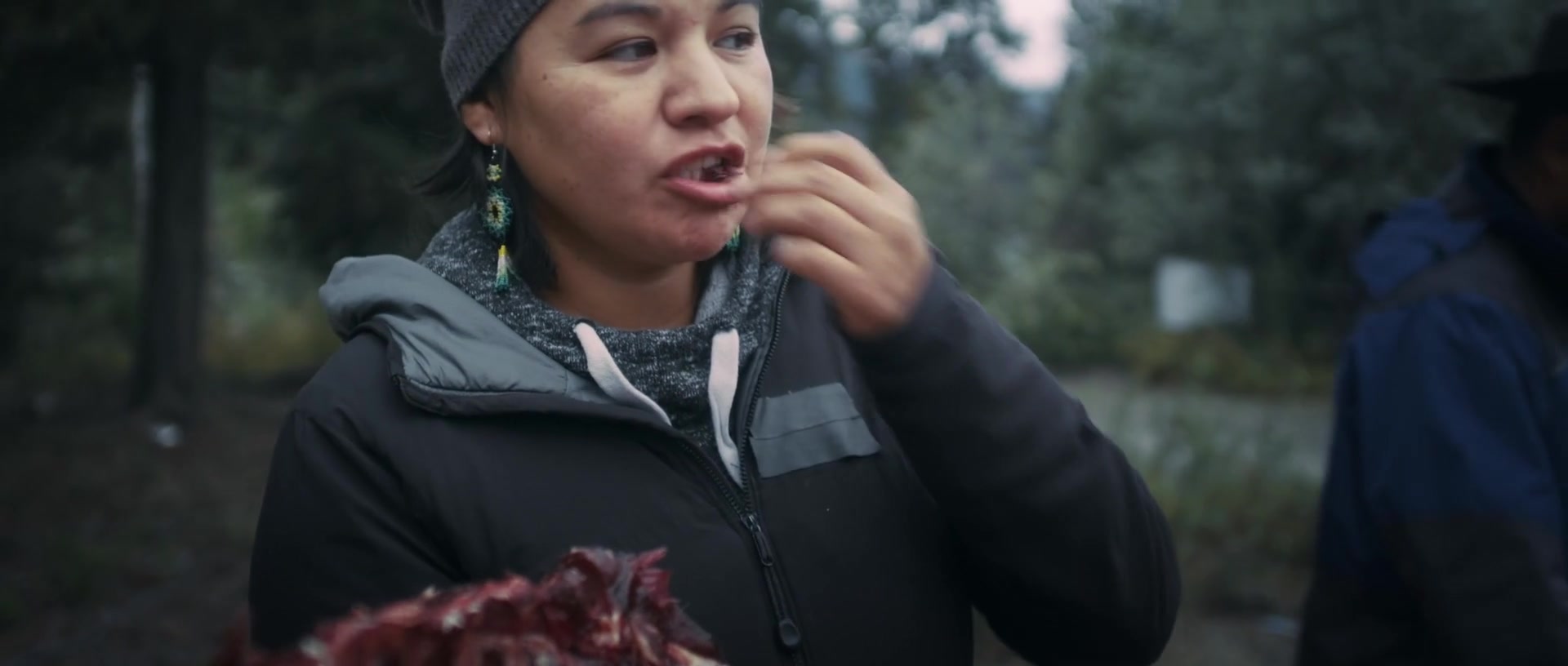 Cezin Nottaway tasting food outdoors
