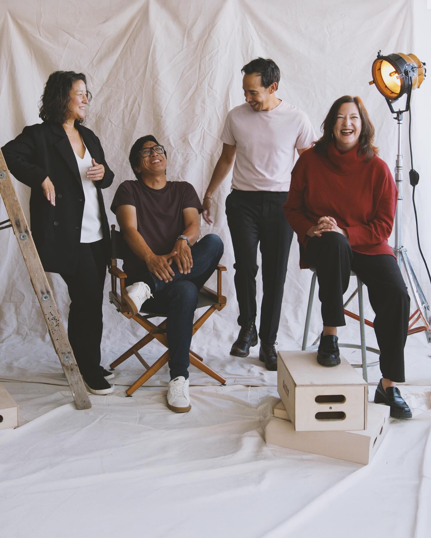 The Black Rhino Creative team laughing together in the studio